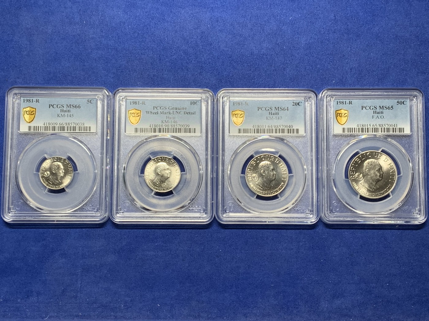 《竞宝斋》第225场-周日，周一，周二 3场 (全场包邮) 4枚一组 PCGS 清年份unc-ms 海地前总统、独裁者 让-克洛德·杜瓦利埃 1981年fao套币