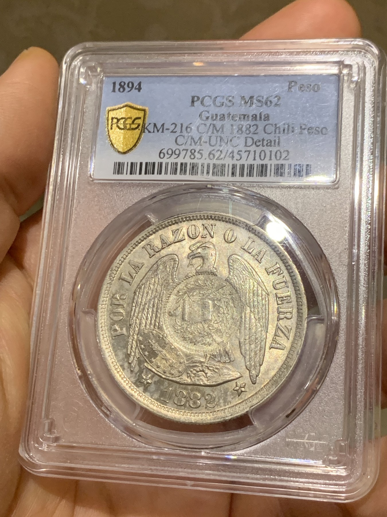 《竞宝斋》第225场-周日，周一，周二 3场 (全场包邮) 冠军分 PCGS-MS62 危地马拉 1894年 加盖 智利比索 热门加盖品种 多为清洗 MS有分较少 光度也非常好 加盖秘鲁常见，智利的少之又少