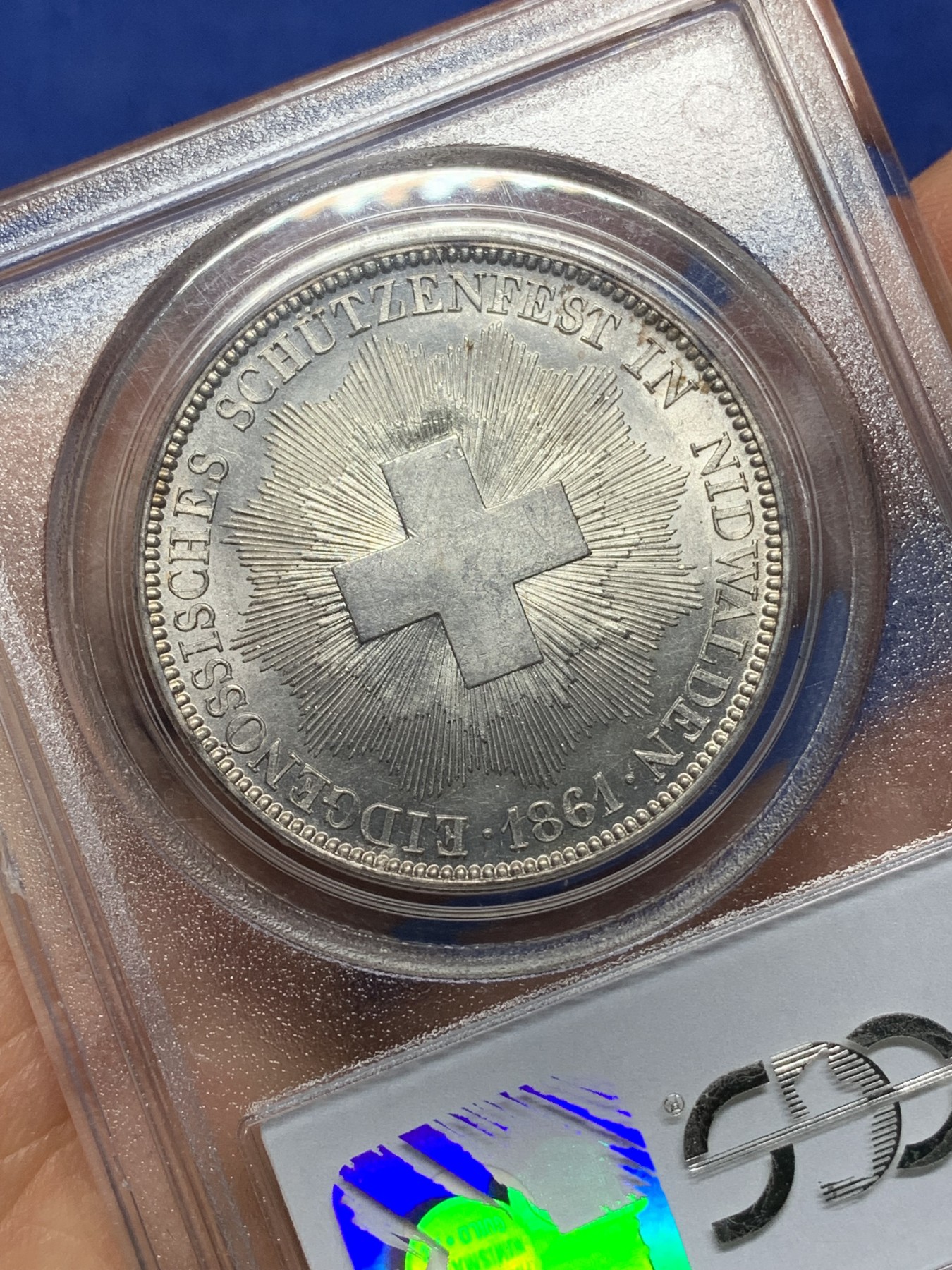《竞宝斋》第225场-周日，周一，周二 3场 (全场包邮) PCGS MS62 1861年瑞士尼瓦尔登射击节5法郎，发行量仅6000枚，高点俱在，底板佳，老白盒严评，老藏家旧藏，这枚射击节法郎品种上MS非常难得