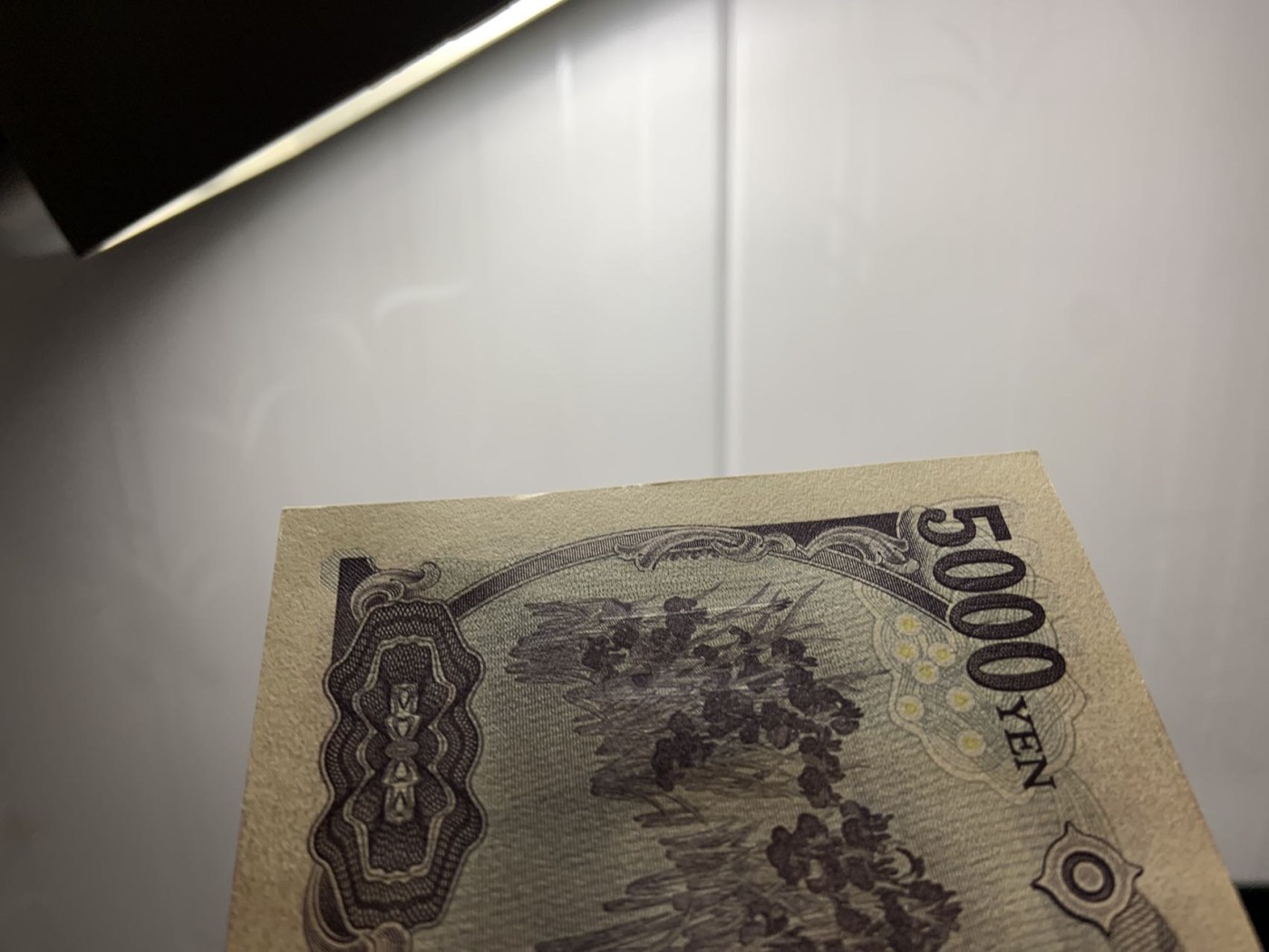 收藏联盟Quantum Auction 第312期拍卖  日本ND (2014)年5000日元 品相UNC- 票面有捆印和边角瑕疵 作家樋口一叶 明年换版