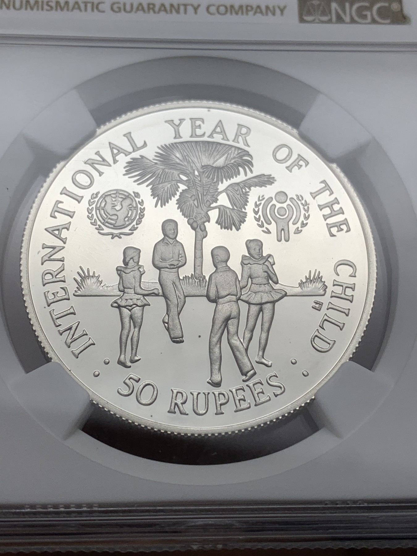 《竞宝斋》第225场-周日，周一，周二 3场 (全场包邮) NGC PF69UC 塞舌尔1980儿童年银币