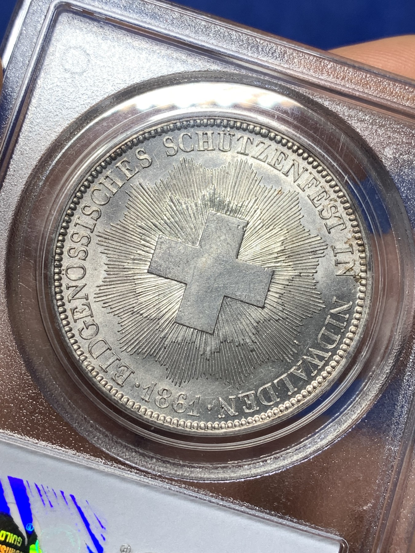 《竞宝斋》第225场-周日，周一，周二 3场 (全场包邮) PCGS MS62 1861年瑞士尼瓦尔登射击节5法郎，发行量仅6000枚，高点俱在，底板佳，老白盒严评，老藏家旧藏，这枚射击节法郎品种上MS非常难得
