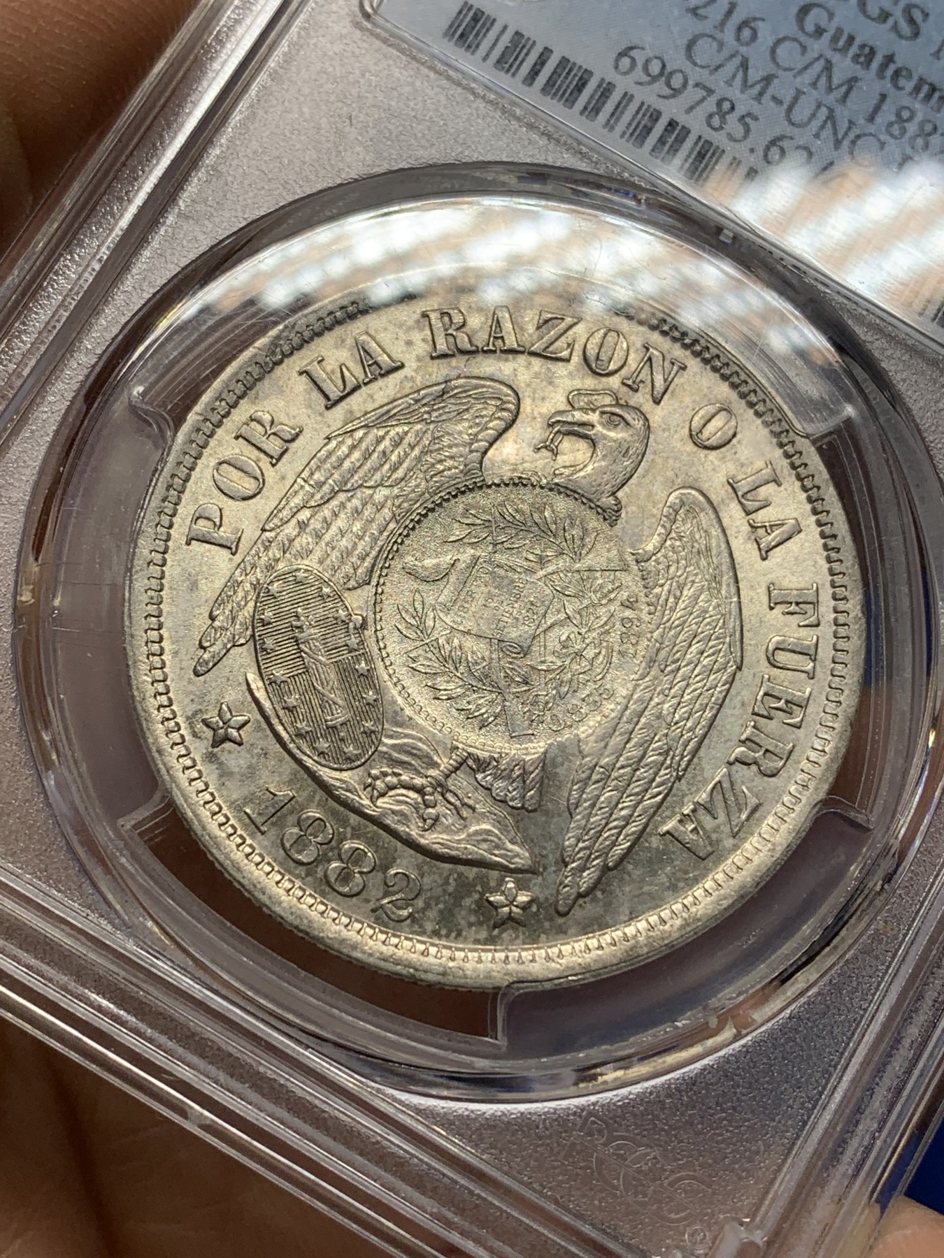 《竞宝斋》第225场-周日，周一，周二 3场 (全场包邮) 冠军分 PCGS-MS62 危地马拉 1894年 加盖 智利比索 热门加盖品种 多为清洗 MS有分较少 光度也非常好 加盖秘鲁常见，智利的少之又少