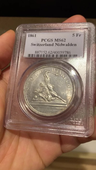 《竞宝斋》第225场-周日，周一，周二 3场 (全场包邮) PCGS MS62 1861年瑞士尼瓦尔登射击节5法郎，发行量仅6000枚，高点俱在，底板佳，老白盒严评，老藏家旧藏，这枚射击节法郎品种上MS非常难得