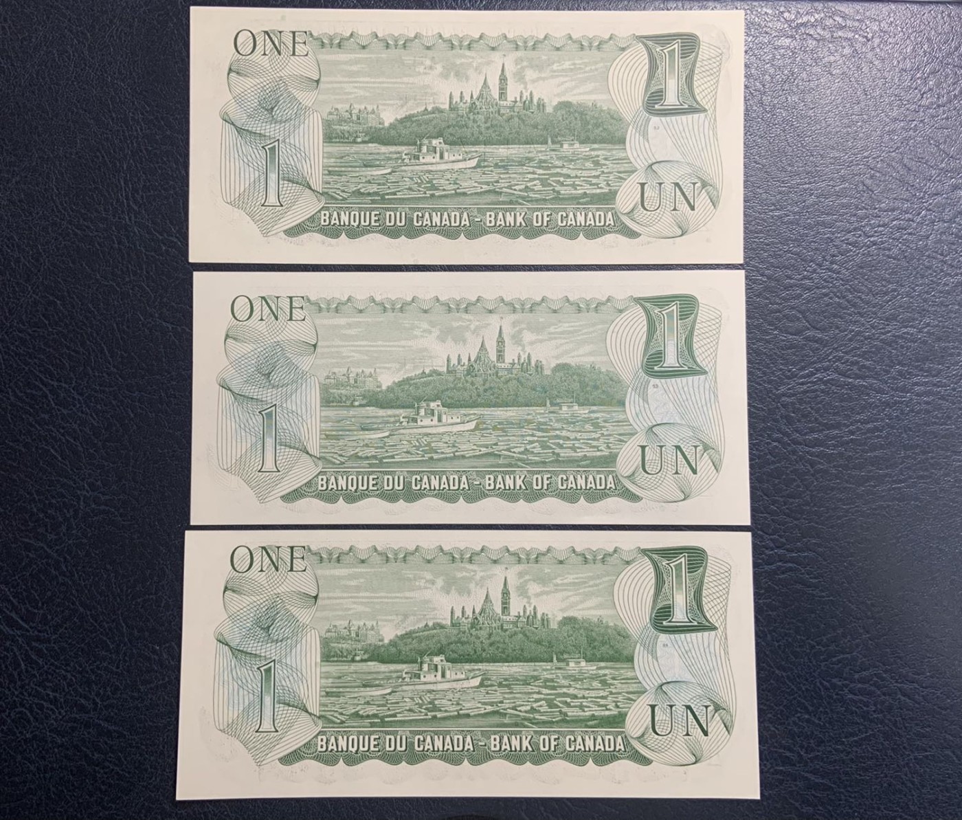 收藏联盟Quantum Auction 第312期拍卖  加拿大1967到1986年1元和2元 品相UNC 1967年1元纪念钞有点钞痕，1986年2元一张为UNC-