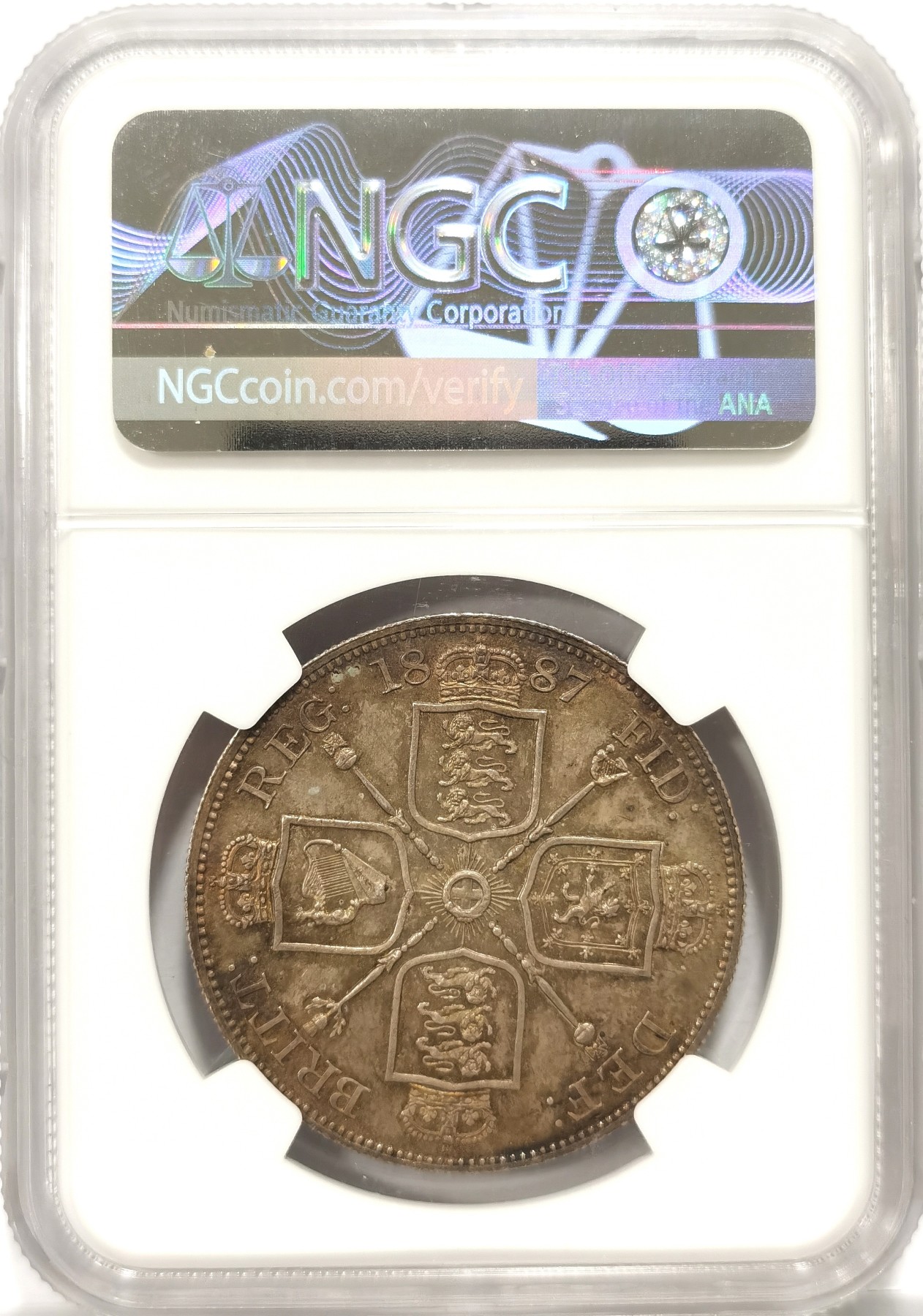 博洋堂世界钱币拍卖第057期（全场包邮） NGC MS65 英国1887年维多利亚高冠4先令银币，阿拉伯数字，亮彩包浆，超高分第三名