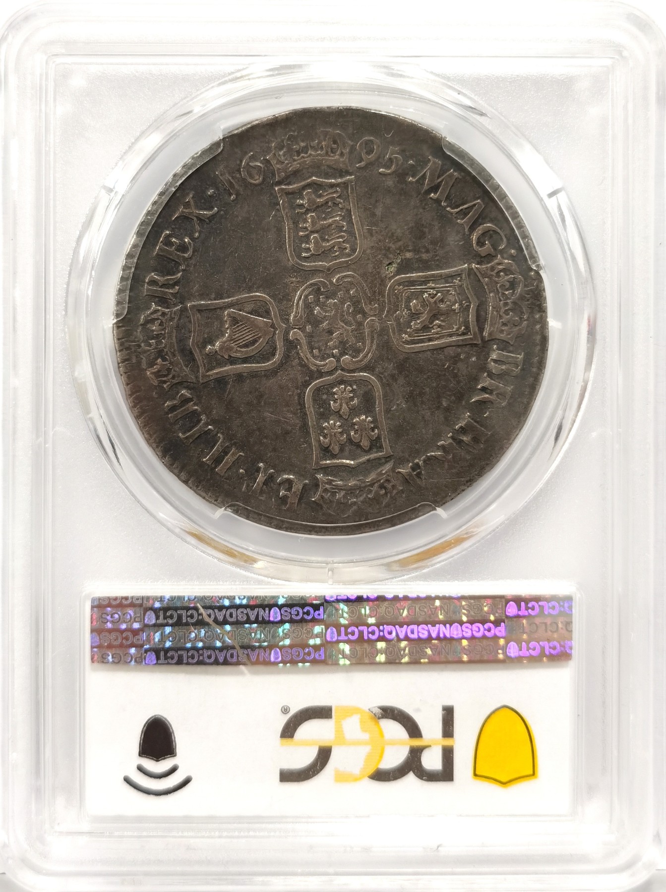 博洋堂世界钱币拍卖第057期（全场包邮） PCGS XF40 1695年英国1克朗银币，康熙年间铸造的银币保存至今能有如此品相者殊为难得，细节极佳，正反面满黑色包浆，对光五彩斑斓美轮美奂，彰显四百年前英国巅峰铸币工艺之作，麦稀奇同年份40分成交价含佣金3908元