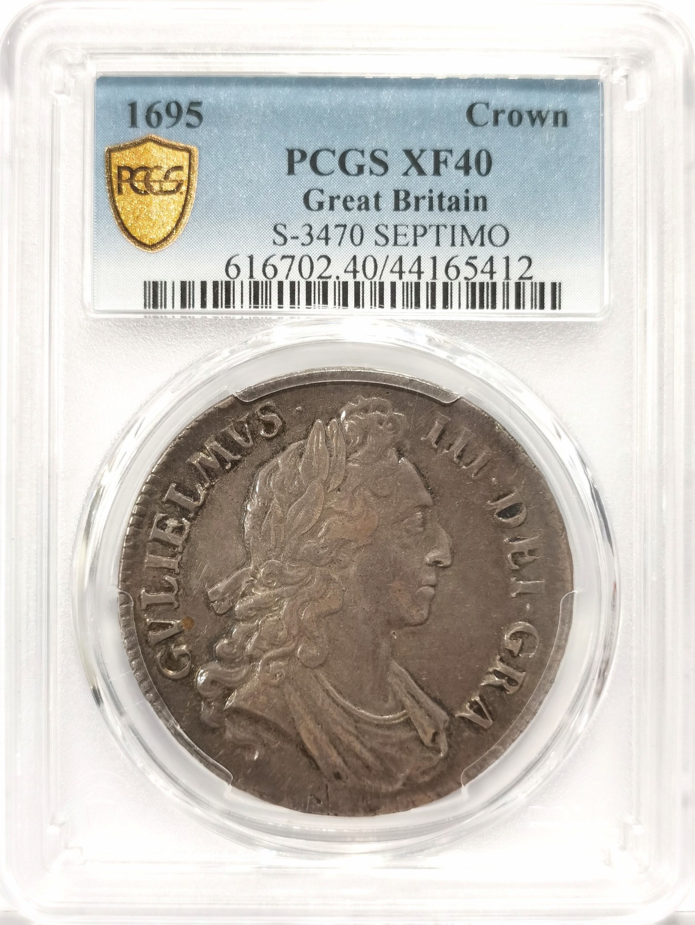博洋堂世界钱币拍卖第057期（全场包邮） PCGS XF40 1695年英国1克朗银币，康熙年间铸造的银币保存至今能有如此品相者殊为难得，细节极佳，正反面满黑色包浆，对光五彩斑斓美轮美奂，彰显四百年前英国巅峰铸币工艺之作，麦稀奇同年份40分成交价含佣金3908元