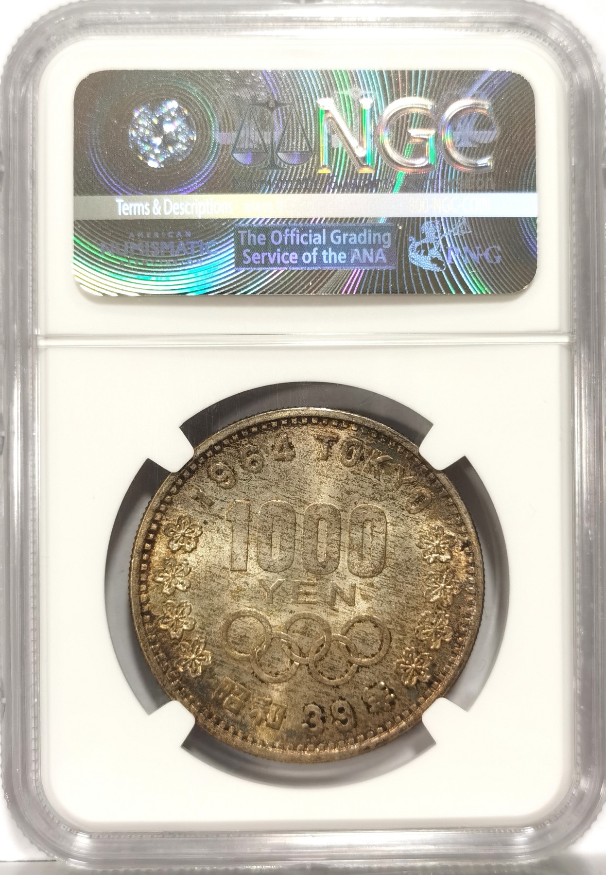 博洋堂世界钱币拍卖第057期（全场包邮） NGC MS65 日本1964年东京奥运会1000纪念银币，五彩包浆，状态佳，非常漂亮
