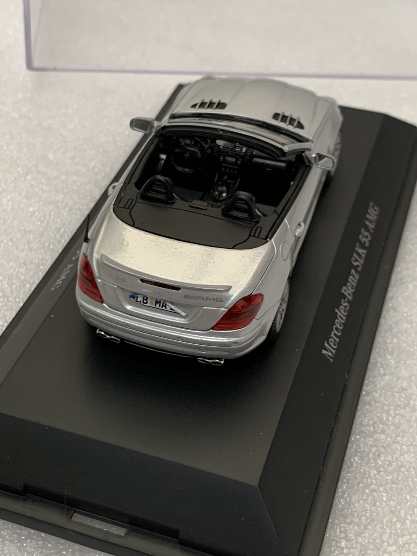 零元拍：奔驰 SLK 55AMG 模型，全新无外彩盒包装，绝版原版200X年古董了，车头贴纸因为胶干有点发卷图片以示