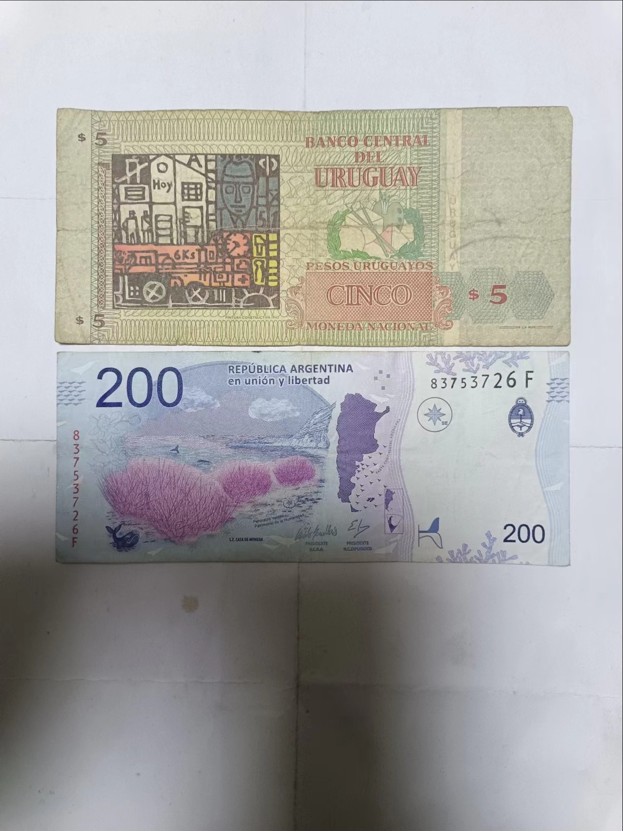 【20231228】非全新纸币第102场 南美洲国家2张纸币，有裂缝和字迹