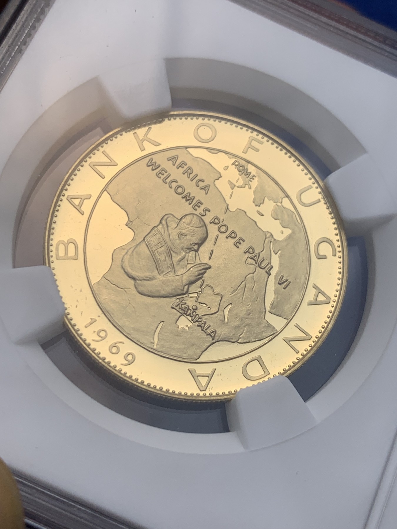 《竞宝斋》圣诞专辑  第一场  第227场 定制纪念章相赠 (全场顺丰包邮) NGC-PF69 UC 1969年乌干达100先令保罗六世到访金币   直径30MM 13.82克 900金 完美品相