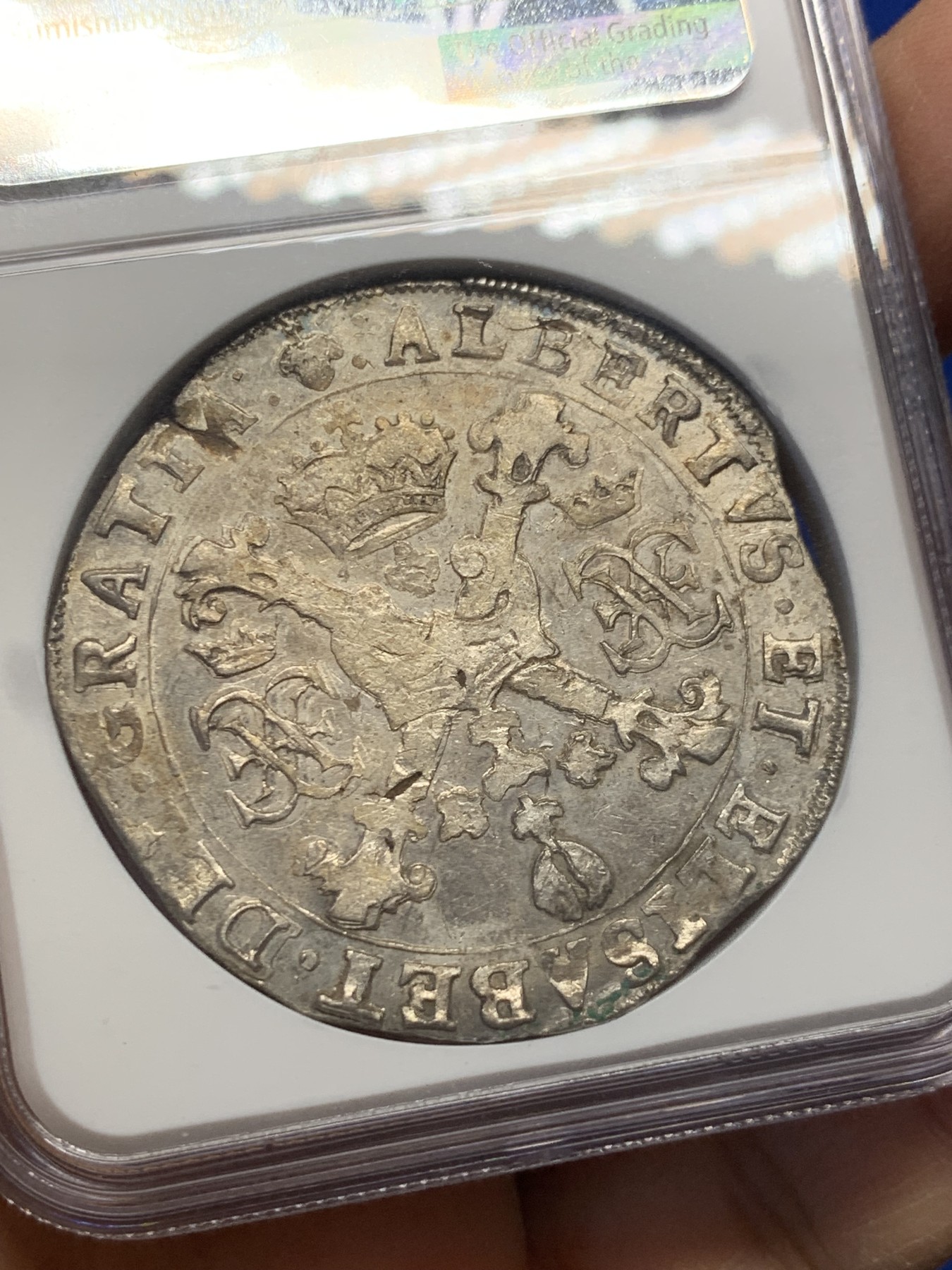 《竞宝斋》圣诞专辑  第一场  第227场 定制纪念章相赠 (全场顺丰包邮) NGC-MS63 1625年西属尼德兰1巴塔贡大银币 地球之王费利佩四世时期铸造，工艺问题导致币胚缺陷，此币镜面底板，压力也不错，是唯一评级记录