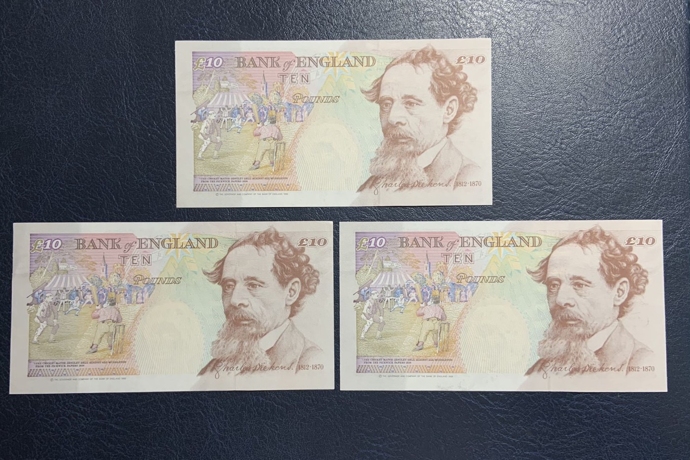 收藏联盟Quantum Auction 第313期拍卖  英国1993年版10镑3张 品相UNC 边角有瑕疵 狄更斯