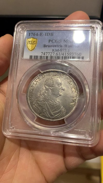 《竞宝斋》圣诞专辑  第一场  第227场 定制纪念章相赠 (全场顺丰包邮) PCGS-MS61 不伦瑞克（布伦瑞克）1764年飞马2/3泰勒银币，原味淡彩，设计精美，正面为公爵戎装像，背面小马设计栩栩如生，这个品种上ms非常难。