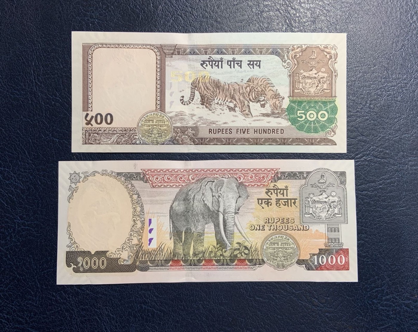 收藏联盟Quantum Auction 第313期拍卖  尼泊尔2002年5到1000卢比 品相UNC 1000卢比边角微瑕，10卢比为纪念钞