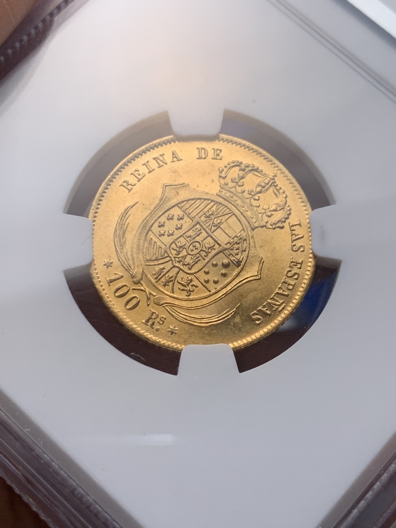 《竞宝斋》圣诞专辑  第一场  第227场 定制纪念章相赠 (全场顺丰包邮) NGC-MS64 西班牙 1861年 伊莎贝拉二世女王 马德里造100R金币（小猪妹） 难得一见的顶级品种 不容错过