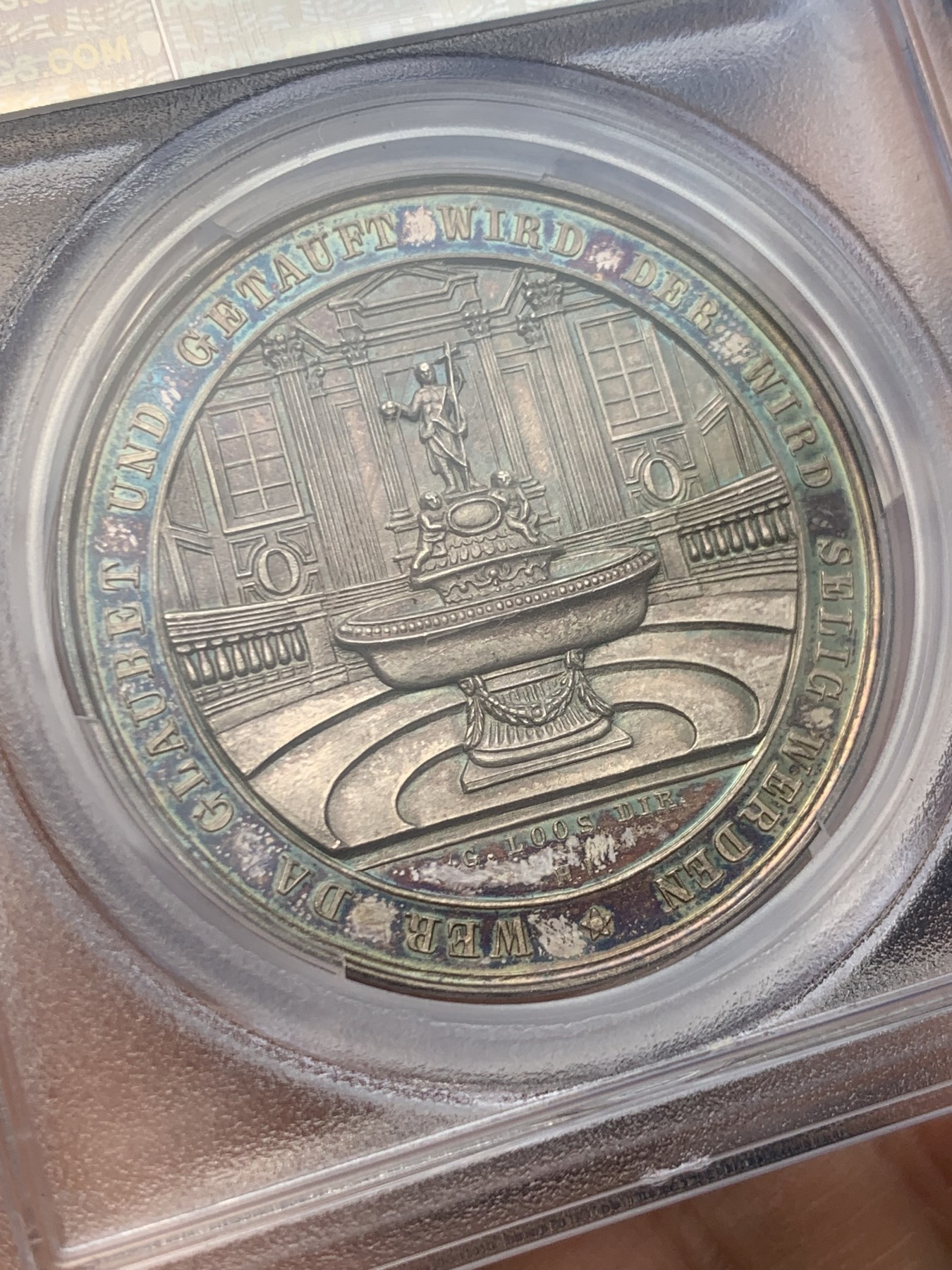 《竞宝斋》圣诞专辑  第一场  第227场 定制纪念章相赠 (全场顺丰包邮) PCGS SP64 德国1800宗教洗礼银章，名家loos作品，五彩镭射完美品，封面广告章