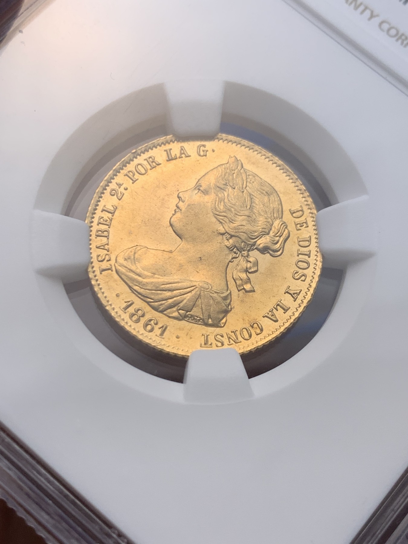 《竞宝斋》圣诞专辑  第一场  第227场 定制纪念章相赠 (全场顺丰包邮) NGC-MS64 西班牙 1861年 伊莎贝拉二世女王 马德里造100R金币（小猪妹） 难得一见的顶级品种 不容错过