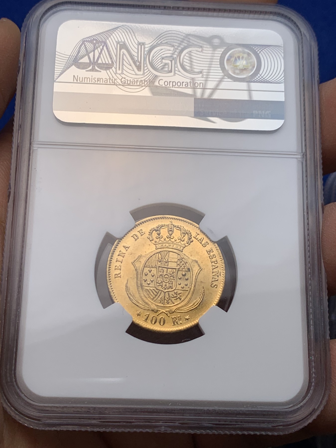 《竞宝斋》圣诞专辑  第一场  第227场 定制纪念章相赠 (全场顺丰包邮) NGC-MS64 西班牙 1861年 伊莎贝拉二世女王 马德里造100R金币（小猪妹） 难得一见的顶级品种 不容错过