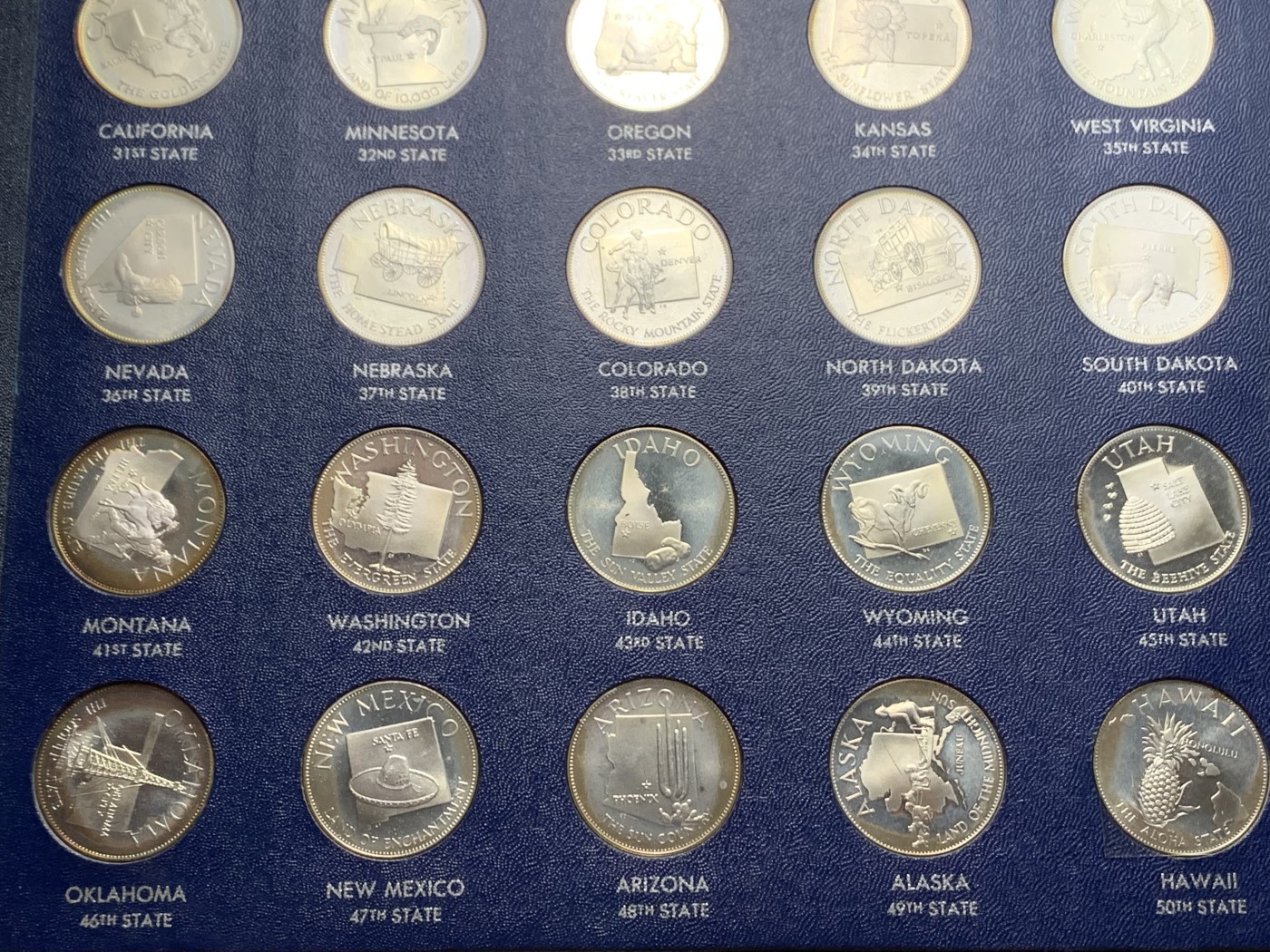 《竞宝斋》圣诞专辑  第一场  第227场 定制纪念章相赠 (全场顺丰包邮) 美国1969年50州精制纯银银章 每枚重14.5克左右 共725克左右 加厚说明书