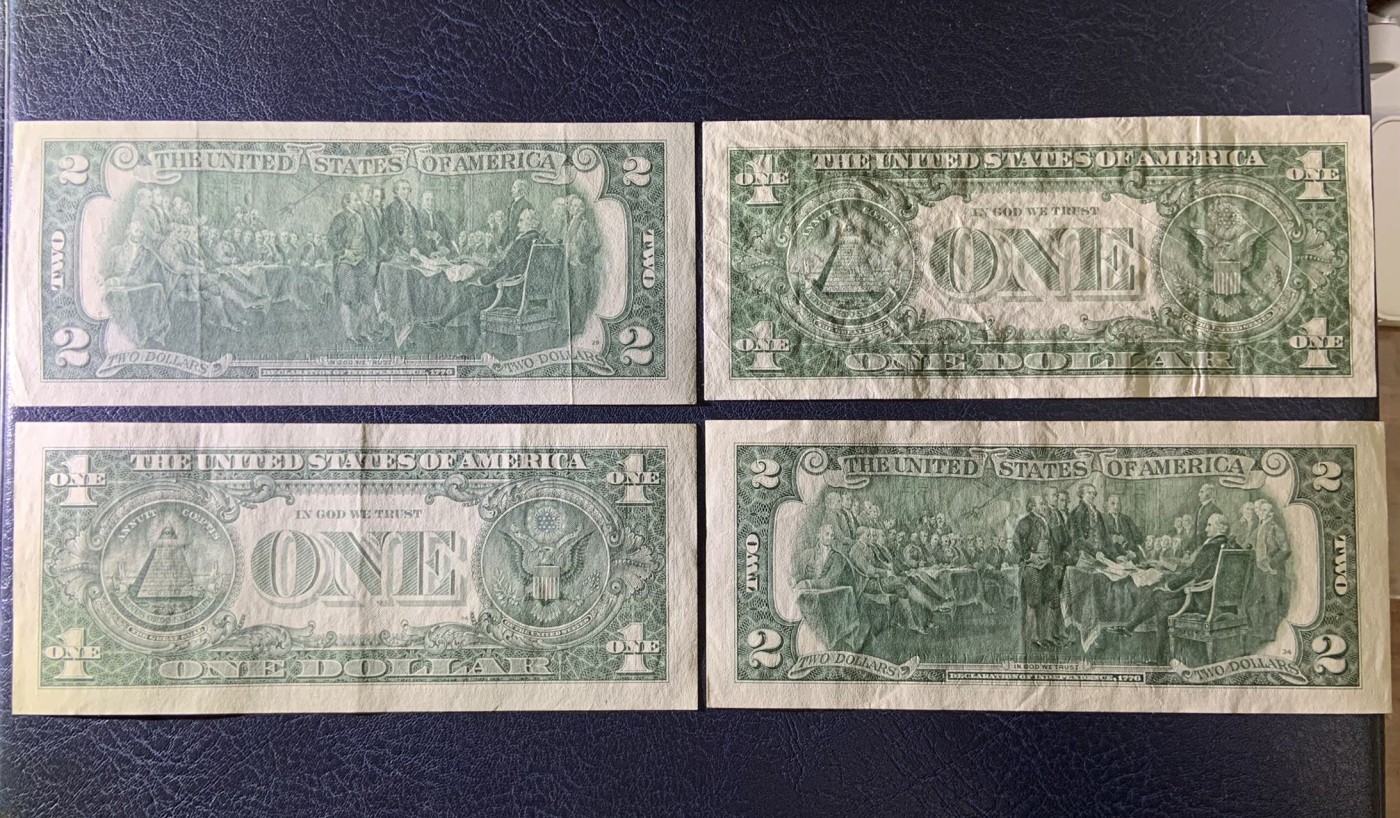 收藏联盟Quantum Auction 第313期拍卖  美国2003和2013年2元，1976年带邮戳2元首发冠和1957年1美元银币券 品相如图