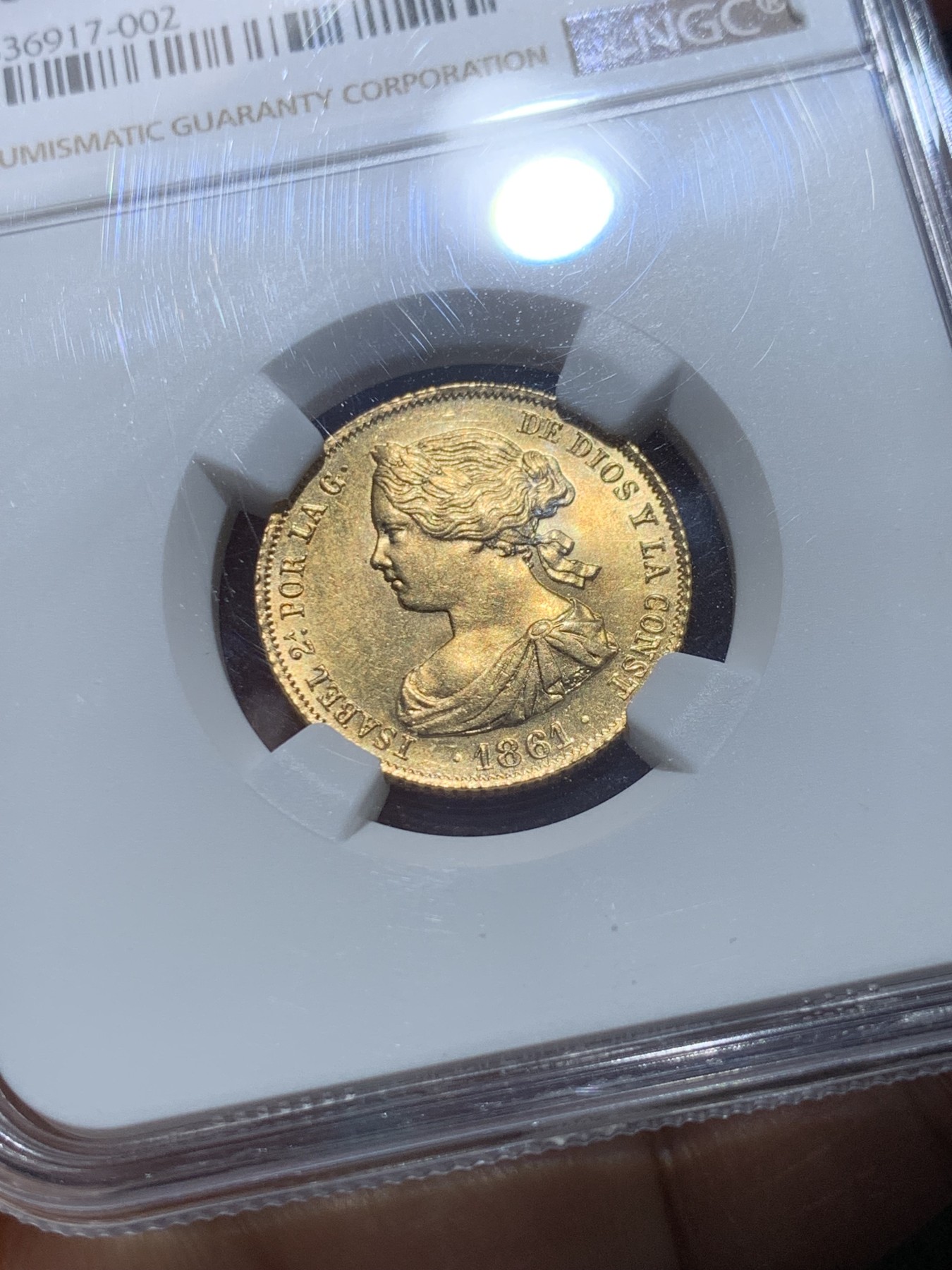 《竞宝斋》圣诞专辑  第一场  第227场 定制纪念章相赠 (全场顺丰包邮) NGC-MS64 西班牙 1861年 伊莎贝拉二世女王 马德里造100R金币（小猪妹） 难得一见的顶级品种 不容错过