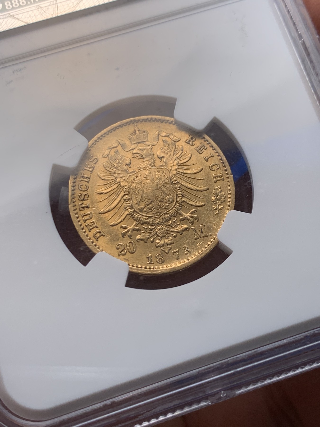 《竞宝斋》圣诞专辑  第一场  第227场 定制纪念章相赠 (全场顺丰包邮) NGC-AU58 德国巴登大公国  1873年20帝国金马克金币 热门的德二短翅鹰，细节和光度都非常好，感觉低评