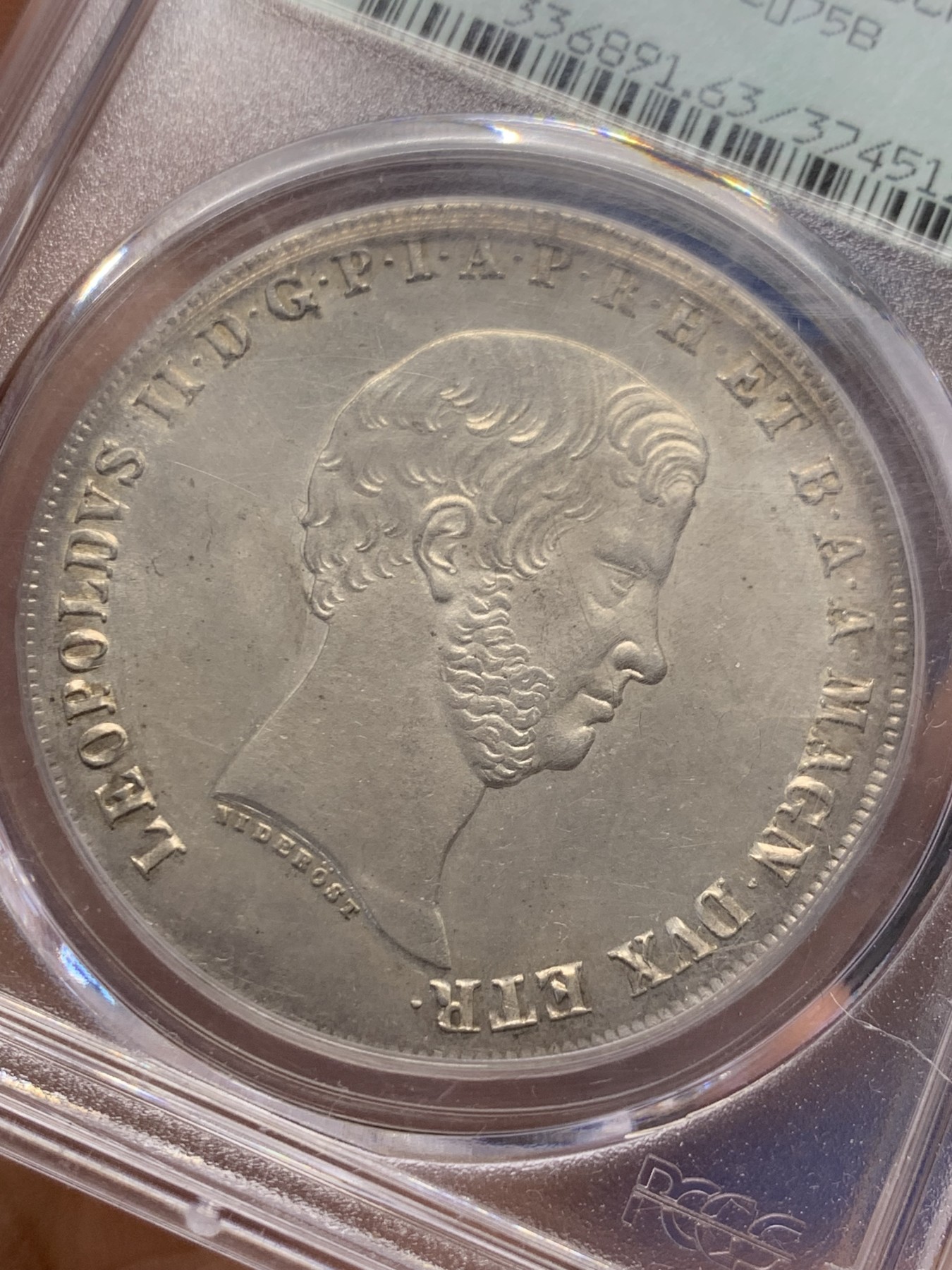 《竞宝斋》圣诞专辑  第一场  第227场 定制纪念章相赠 (全场顺丰包邮) PCGS MS63 1856年托斯卡纳大公国4Fior大银币，意大利系列的经典，瑰宝之作，35周年纪念盒，绝对严评。高点均在，币面丝滑，如凝脂般的雪肌令人陶醉，欲罢不能。早期严评。