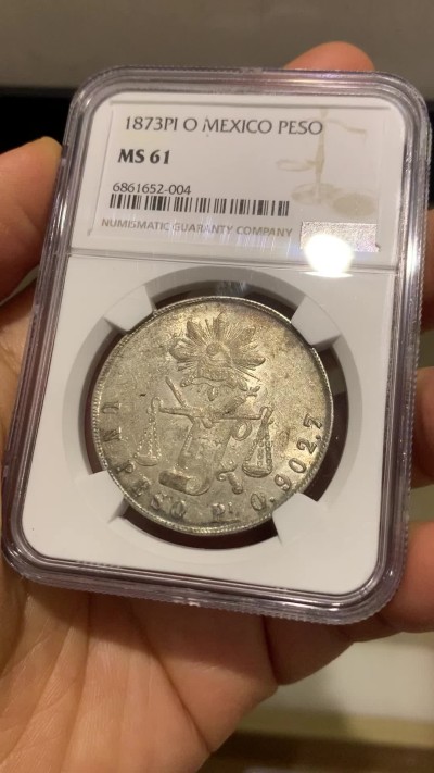 《竞宝斋》圣诞专辑  第二场  第228场 定制纪念章相赠 (全场顺丰包邮) NGC MS61 墨西哥 1873年 PI 天平鹰洋 1比索银币 底板带光 包浆带彩 非常不错