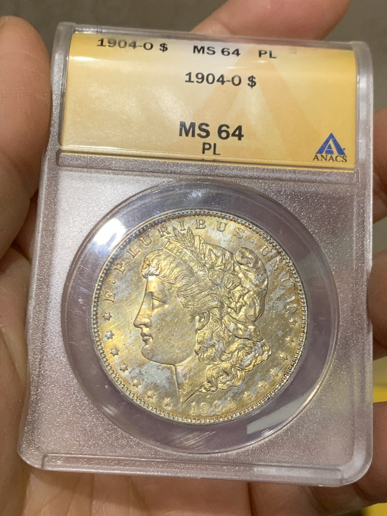 《竞宝斋》圣诞专辑  第二场  第228场 定制纪念章相赠 (全场顺丰包邮) ANACS-MS64PL 美国 1904年 1美元 摩根银币 镜面+金色包浆 可以当镜子的品相