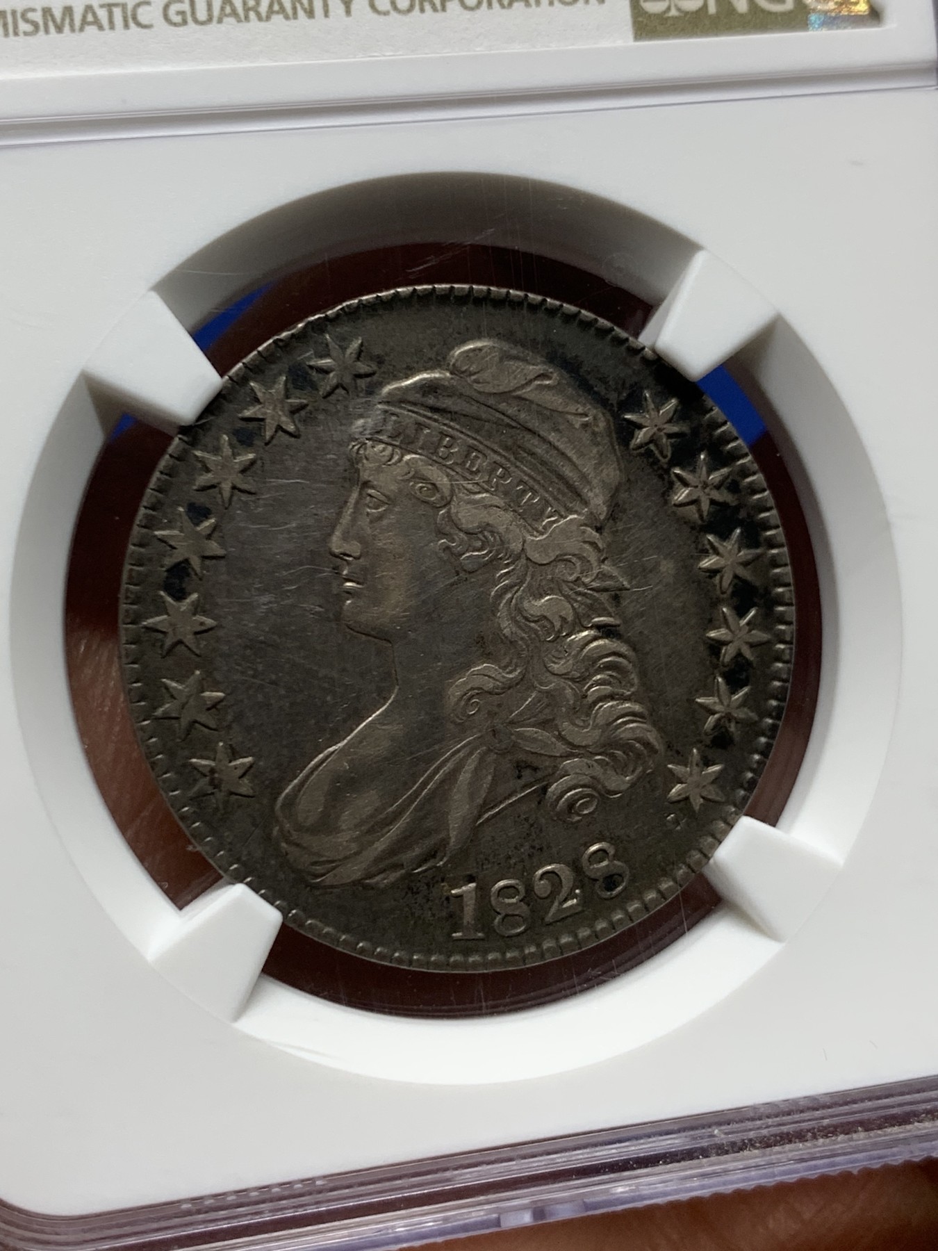 《竞宝斋》圣诞专辑  第二场  第228场 定制纪念章相赠 (全场顺丰包邮) NGC AUD 美国1828年美利坚女人大波浪半美元银币 极少见品种 底板佳 细节好 未见清洗