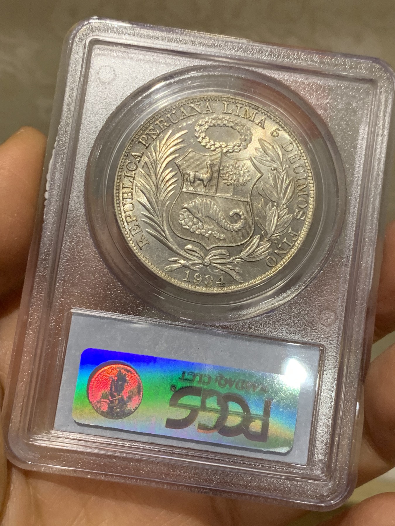 《竞宝斋》圣诞专辑  第二场  第228场 定制纪念章相赠 (全场顺丰包邮) PCGS-MS64 秘鲁 1934年 1索尔 pc早期老白盒 光度十足 分数高