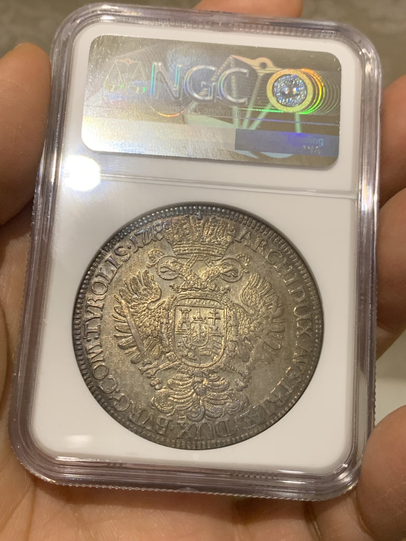 《竞宝斋》圣诞专辑  第二场  第228场 定制纪念章相赠 (全场顺丰包邮) NGC-MS62 神圣罗马帝国 1718/7年 查理六世泰勒骑字版大银币 奥地利大波浪神罗泰勒   彩金包浆 稀少骑字版。全网唯一骑字亚军分，上面就一个63分。