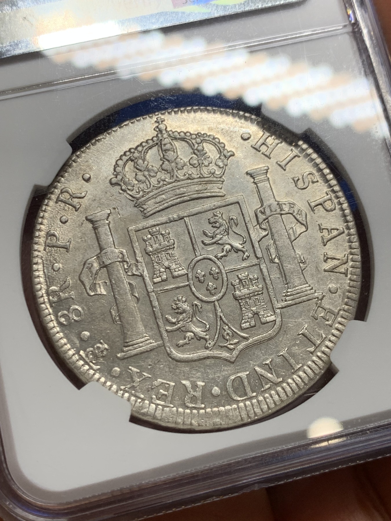 《竞宝斋》圣诞专辑  第二场  第228场 定制纪念章相赠 (全场顺丰包邮) NGC AU55玻利维亚1778年卡洛斯三世双柱银币，早期好年份，打制深，好品难得，ngc美国特色标签，ha拍卖行近期在10月份同年份ngcXF40成交价552刀约4000rmb，盒子边缘小磕。