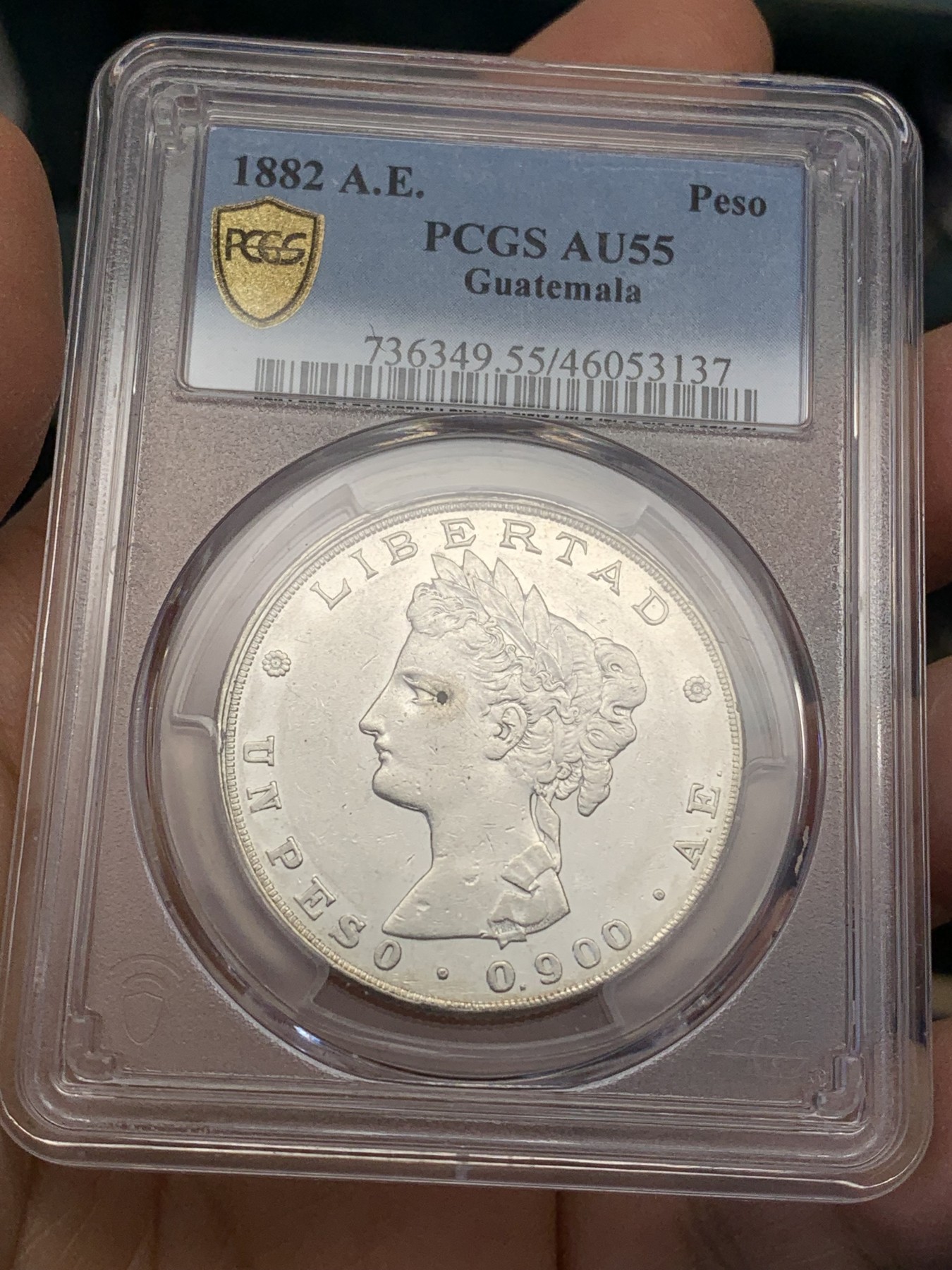 《竞宝斋》圣诞专辑  第二场  第228场 定制纪念章相赠 (全场顺丰包邮) 冠军分 PCGS AU55 危地马拉1882年1比索银币 稀见品种