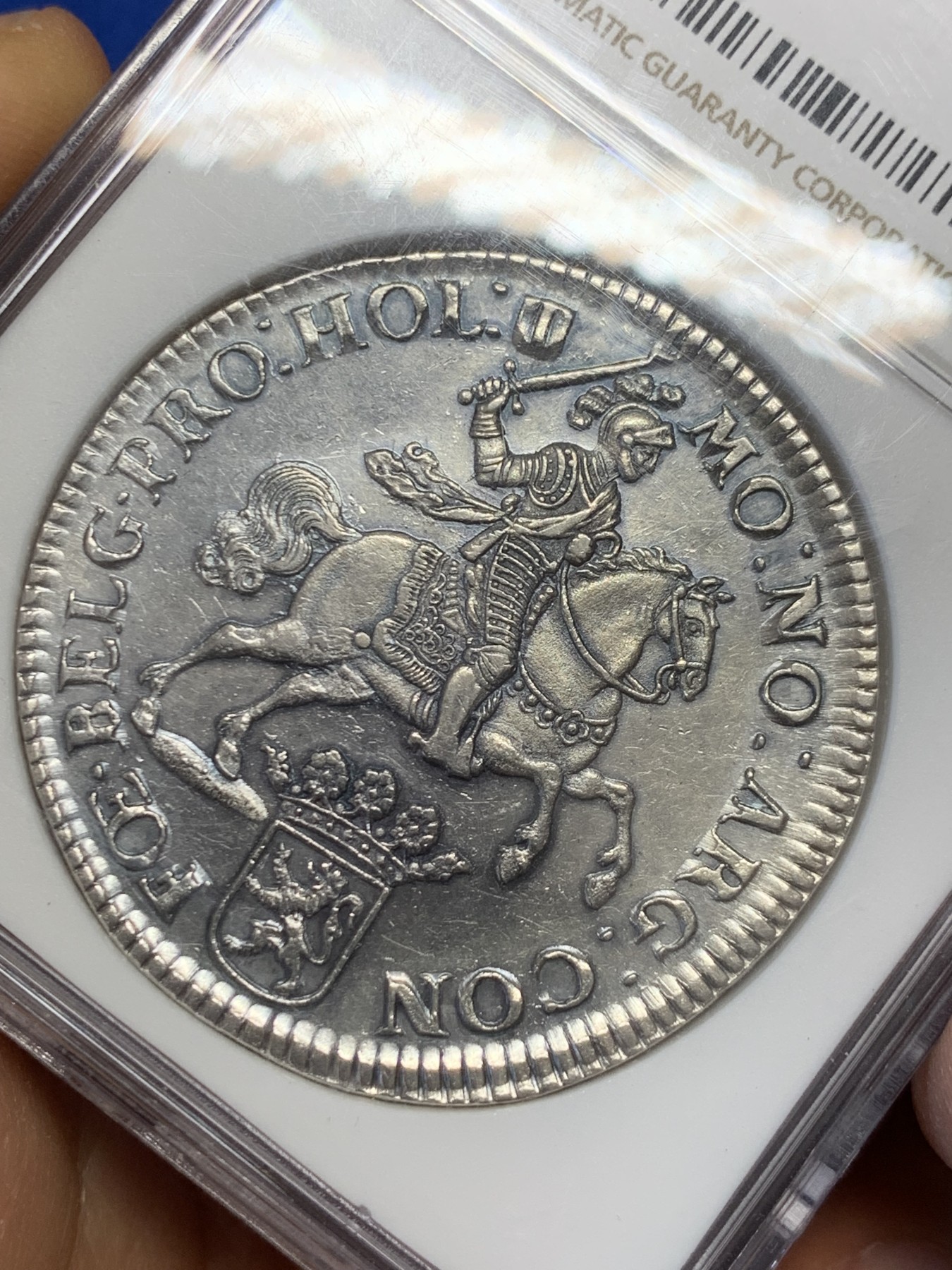 《竞宝斋》圣诞专辑  第二场  第228场 定制纪念章相赠 (全场顺丰包邮) 稀少亚军分！NGC MS61 荷兰 1673 荷兰省 2杜卡特 大马剑银币 64.55克 双倍的快乐 底板光度好 全深打 非常难的品种 上涨幅度惊人