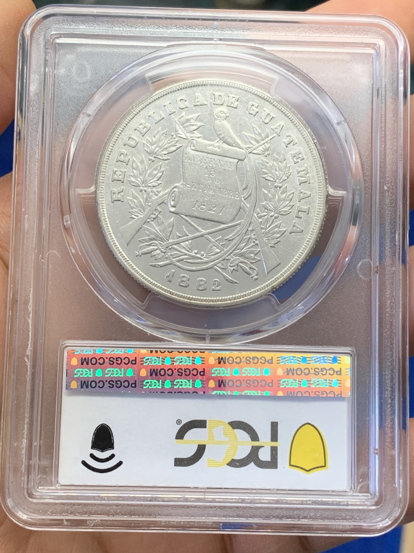 《竞宝斋》圣诞专辑  第二场  第228场 定制纪念章相赠 (全场顺丰包邮) 冠军分 PCGS AU55 危地马拉1882年1比索银币 稀见品种