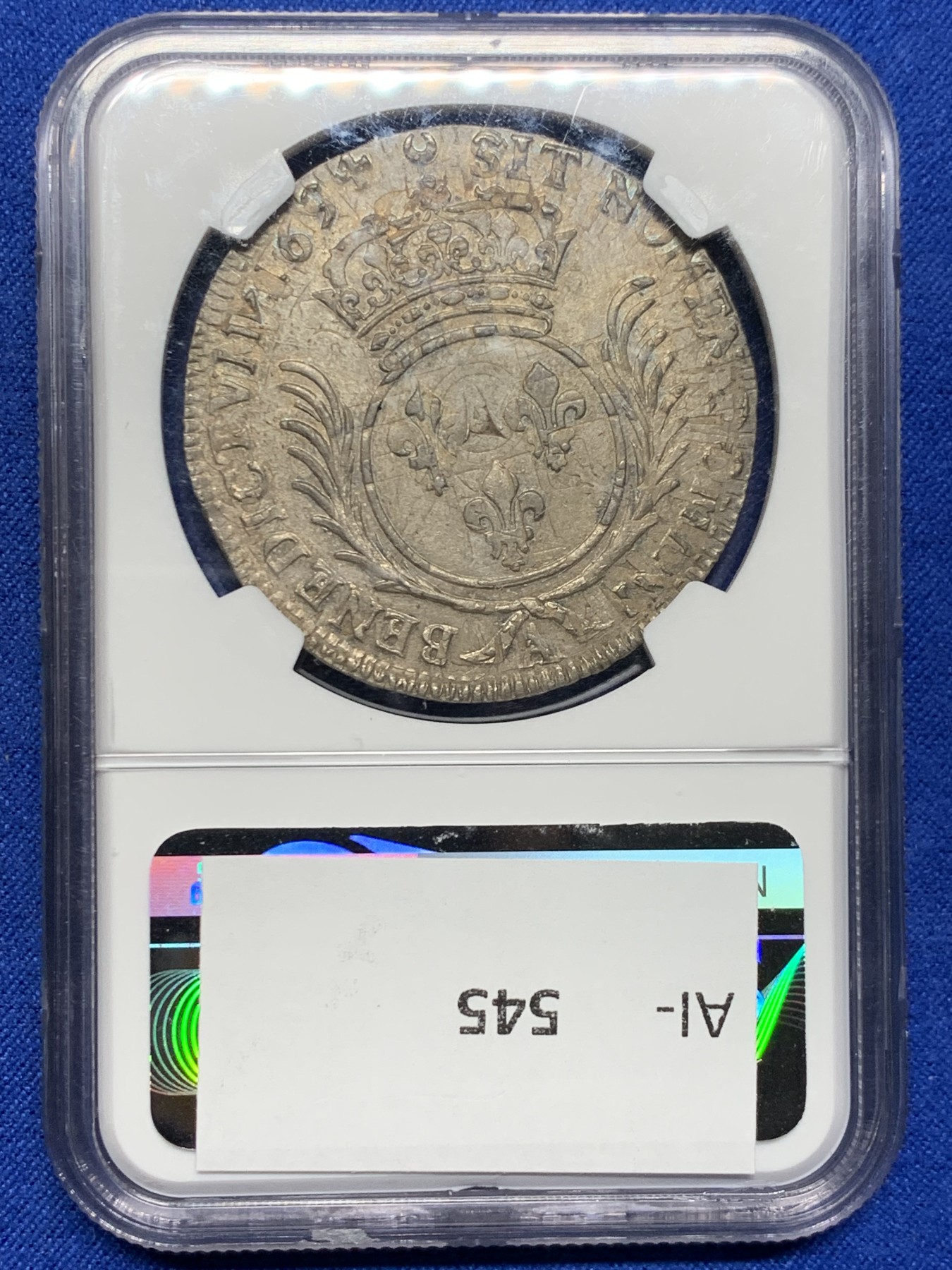 《竞宝斋》圣诞专辑  第二场  第228场 定制纪念章相赠 (全场顺丰包邮) NGC-AU58 太阳王埃居，法国1694年路易十四埃居大银币，底板带光，原味均匀的巧克力包浆，厚重的历史感，人像清晰打制极佳，无减重痕迹，在路易十四的复打币时代十分难得，太阳王埃居出分极难，少见高分好品。