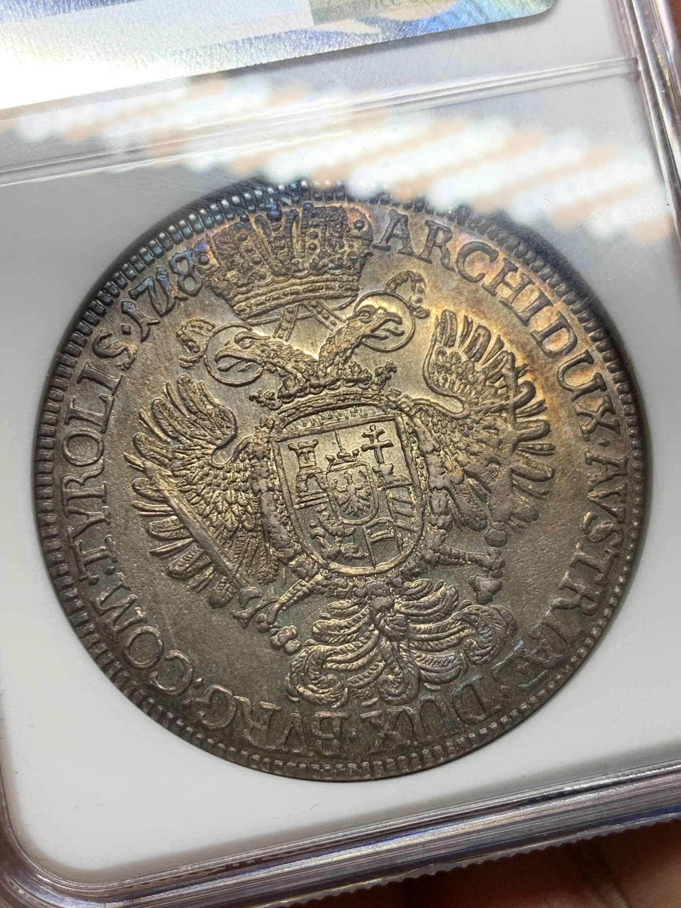 《竞宝斋》圣诞专辑  第二场  第228场 定制纪念章相赠 (全场顺丰包邮) NGC-MS62 神圣罗马帝国 1718/7年 查理六世泰勒骑字版大银币 奥地利大波浪神罗泰勒   彩金包浆 稀少骑字版。全网唯一骑字亚军分，上面就一个63分。