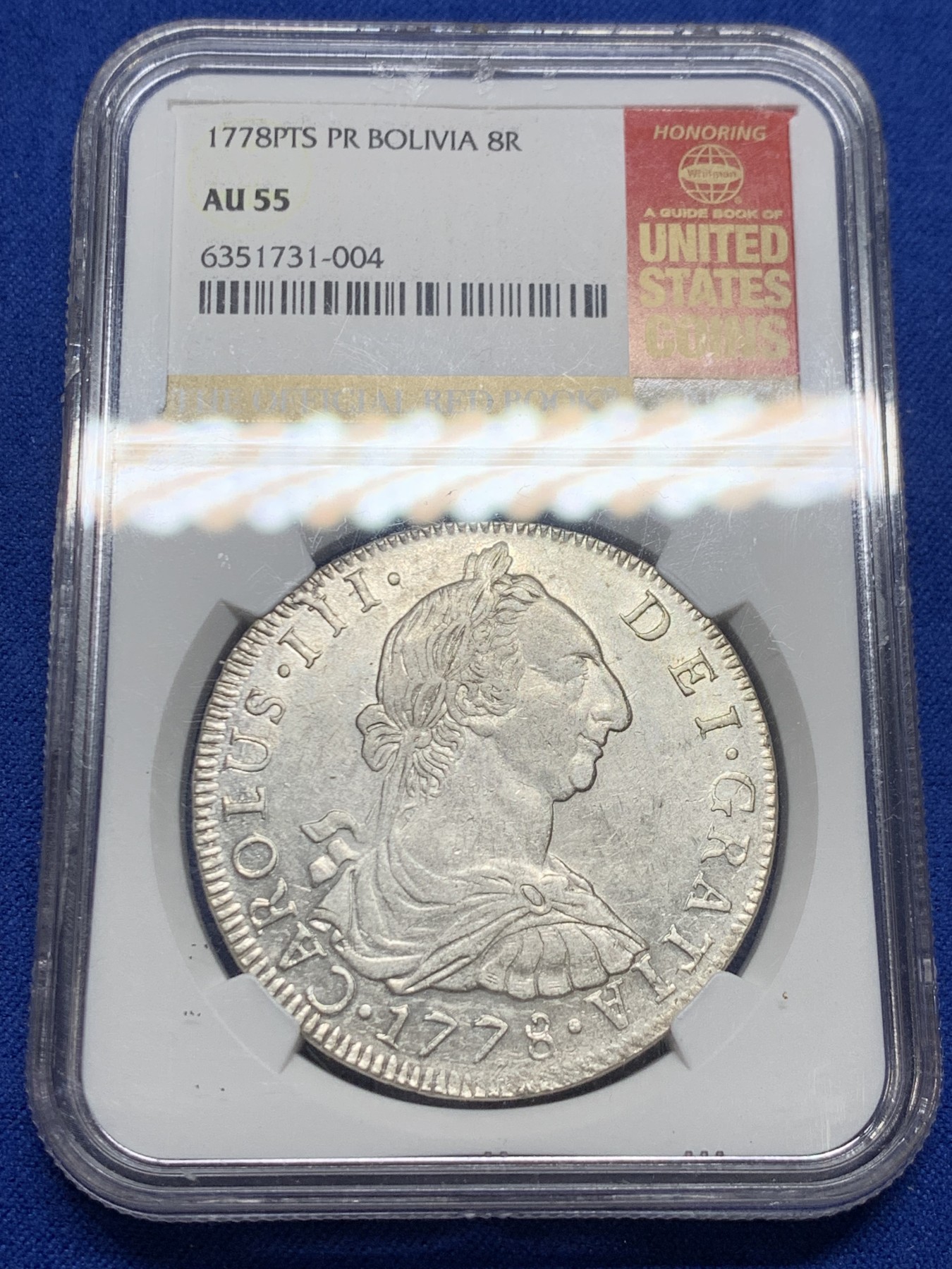《竞宝斋》圣诞专辑  第二场  第228场 定制纪念章相赠 (全场顺丰包邮) NGC AU55玻利维亚1778年卡洛斯三世双柱银币，早期好年份，打制深，好品难得，ngc美国特色标签，ha拍卖行近期在10月份同年份ngcXF40成交价552刀约4000rmb，盒子边缘小磕。
