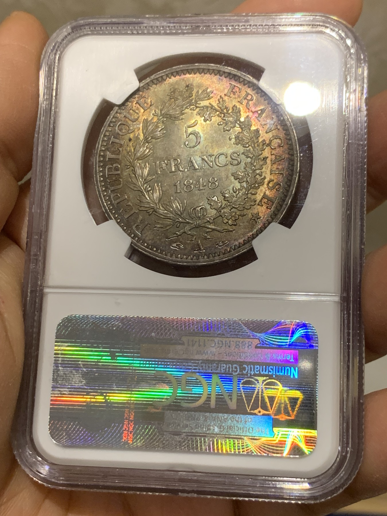 《竞宝斋》圣诞专辑  第二场  第228场 定制纪念章相赠 (全场顺丰包邮) NGC-MS65 法国 1848年传世五彩包浆大力神5法郎银币。灯光下包浆呈现绚丽五彩包浆。65顶级分数，状态好于191期6650元成交那枚。