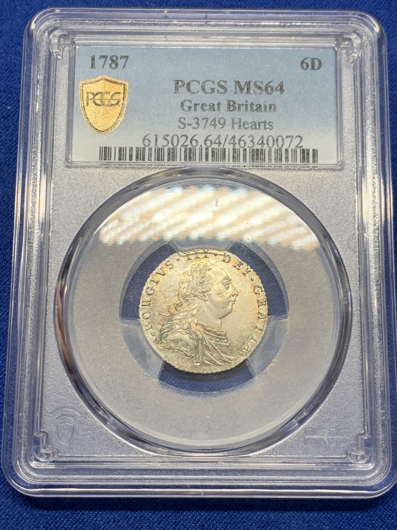 《竞宝斋》圣诞专辑  第二场  第228场 定制纪念章相赠 (全场顺丰包邮) PCGS MS64 英国1787乔治三世6便士 顶级原光底板 黄金彩 币边环绕彩虹 状态可遇而不可求 PCGS封面币在其面前都相形见绌