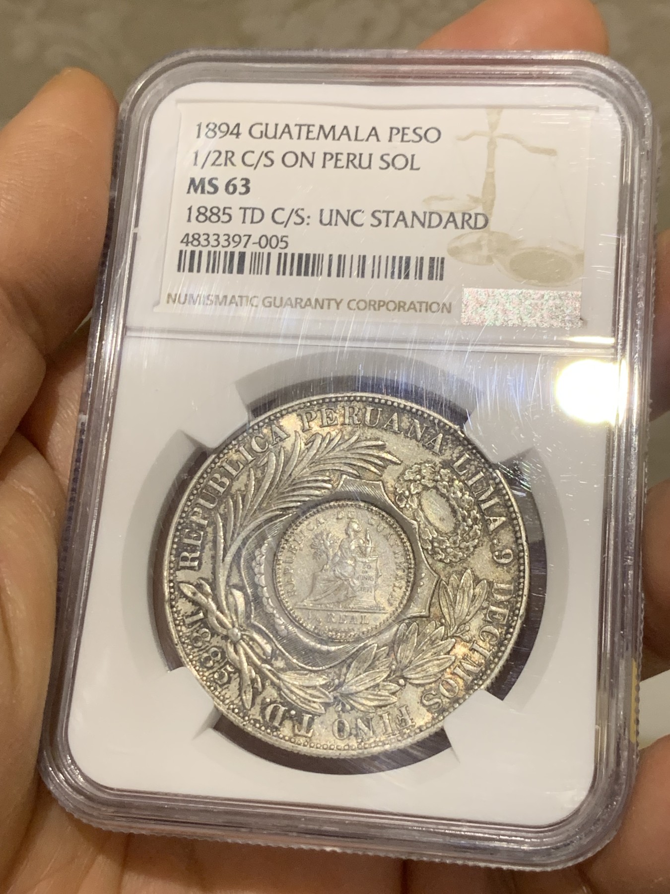 《竞宝斋》圣诞专辑  第二场  第228场 定制纪念章相赠 (全场顺丰包邮) NGC-MS63 危地马拉 1894年 加盖秘鲁比索 热门加盖品种 中南美洲大热 HA23年11月N61成交432美金