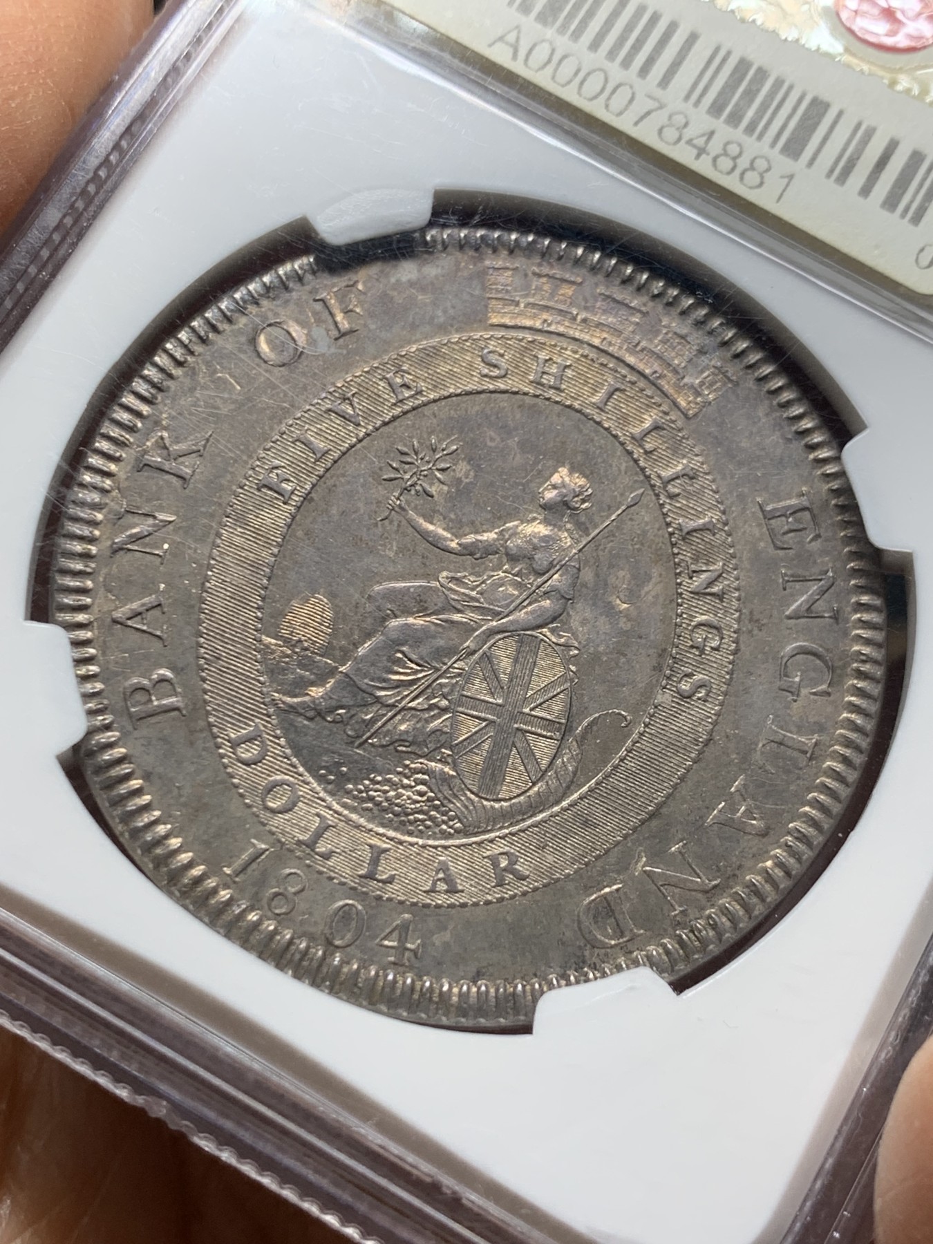 《竞宝斋》圣诞专辑  第二场  第228场 定制纪念章相赠 (全场顺丰包邮) NGC-MS62 英国乔三 1804年 英格兰银行 5先令大银币 一流的传世包浆 暴涨品种 底板带PL版 状态好