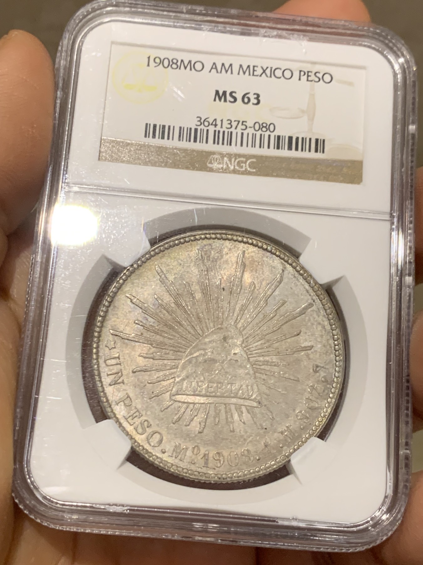 《竞宝斋》圣诞专辑  第二场  第228场 定制纪念章相赠 (全场顺丰包邮) NGC-MS63 1908年墨西哥1比索 直边鹰洋 原状态好味道侧光下双面淡五彩包浆。墨西哥城造币厂出品，验银师标记AM。