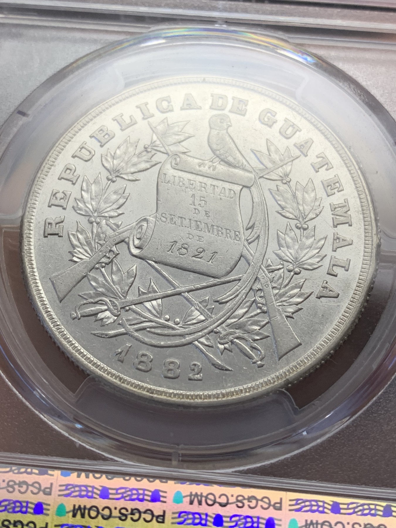 《竞宝斋》圣诞专辑  第二场  第228场 定制纪念章相赠 (全场顺丰包邮) 冠军分 PCGS AU55 危地马拉1882年1比索银币 稀见品种