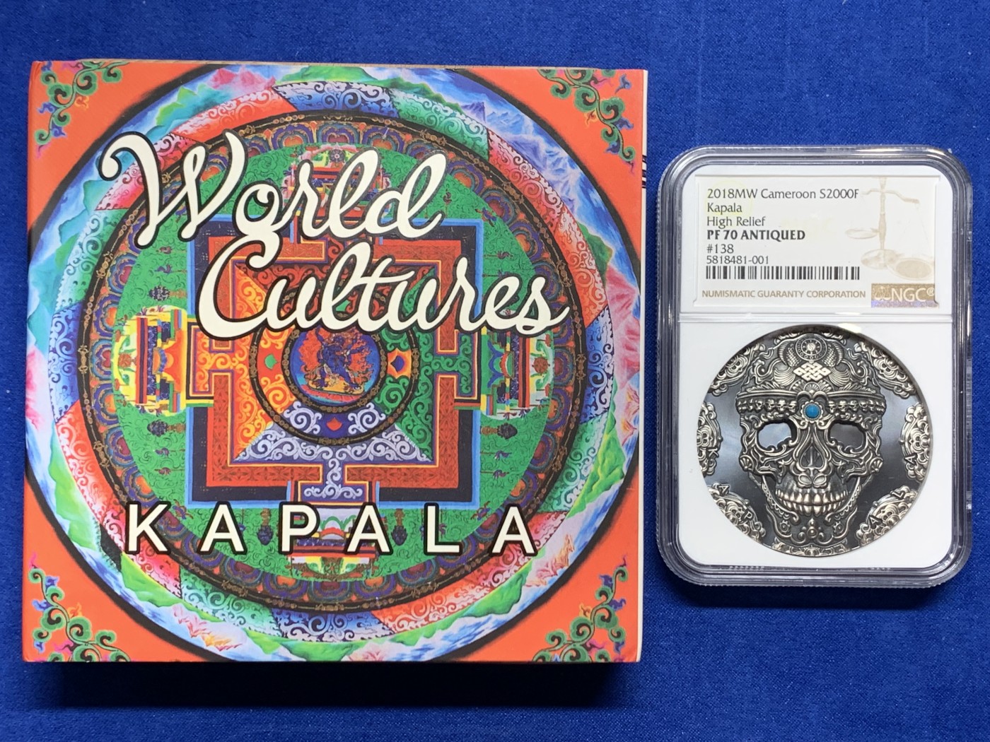 《竞宝斋》圣诞专辑  第二场  第228场 定制纪念章相赠 (全场顺丰包邮) NGC PF70 2018喀麦隆 世界文化系列 第一枚，卡帕拉头盖镶嵌绿松石 2盎司 银币 编号138  盒证齐全