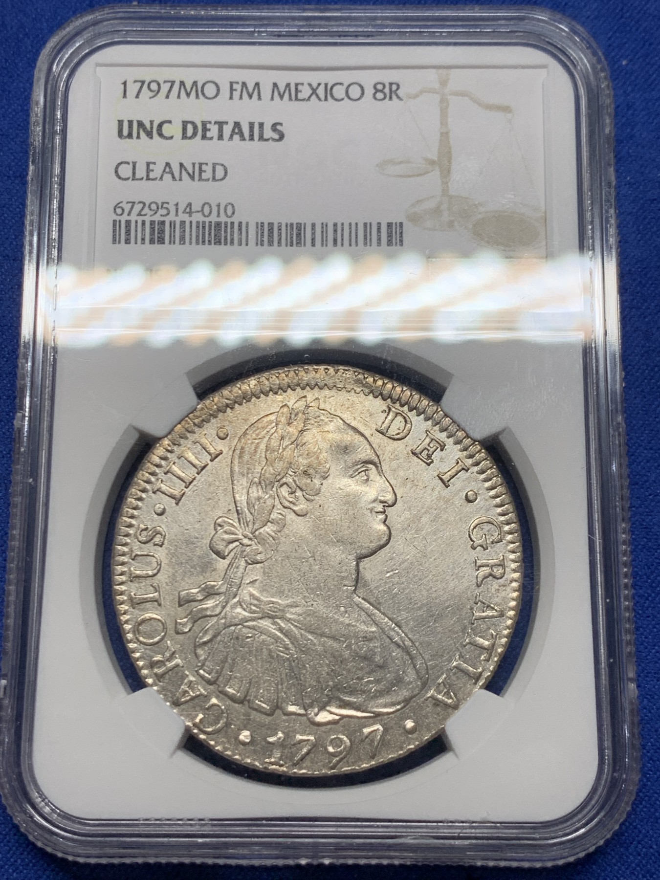 《竞宝斋》圣诞专辑  第二场  第228场 定制纪念章相赠 (全场顺丰包邮) NGC UNC 西属墨西哥1797年MO FM卡洛斯四世双柱8R银币 未流通状态 高性价比 细节见图