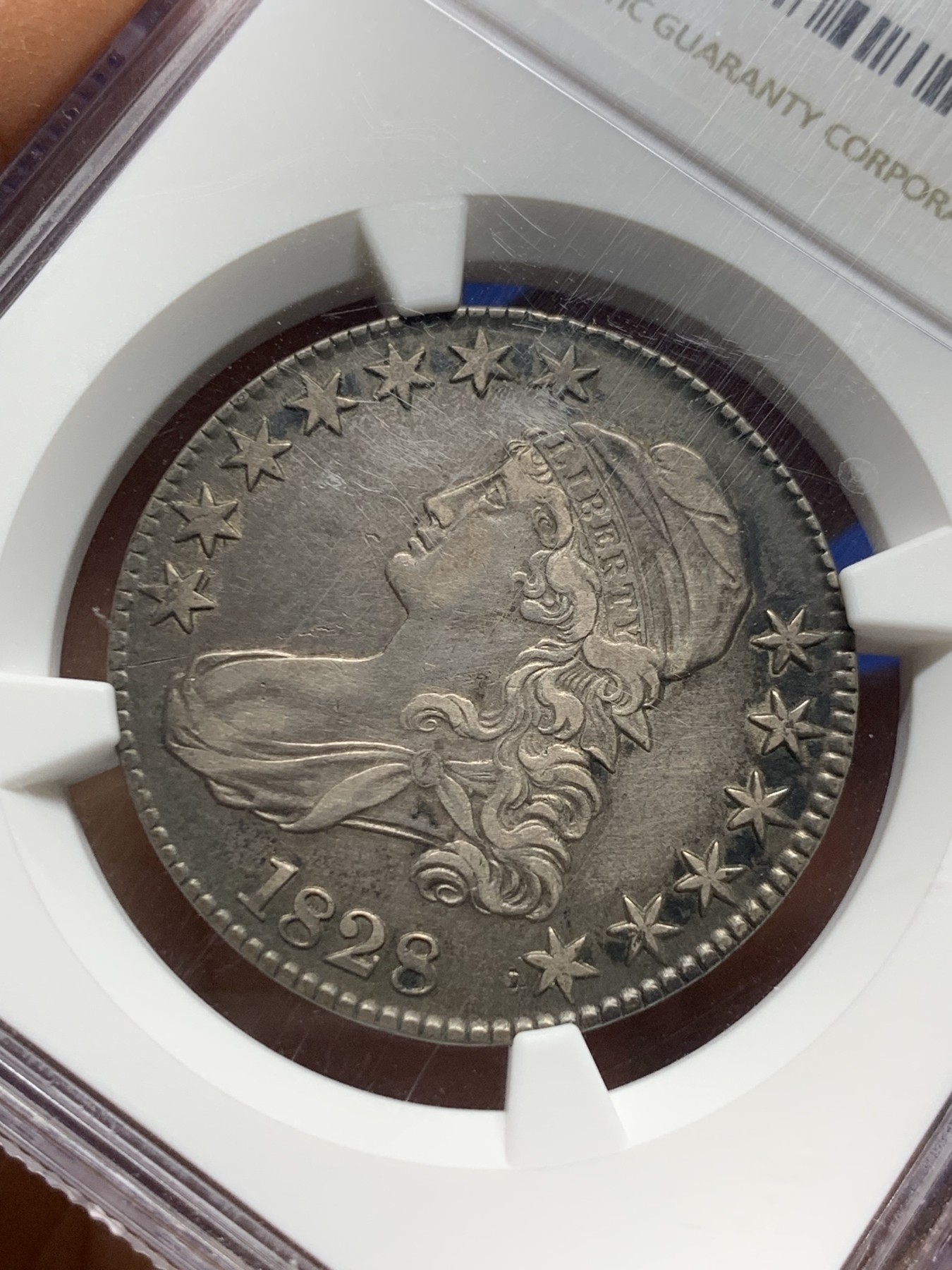 《竞宝斋》圣诞专辑  第二场  第228场 定制纪念章相赠 (全场顺丰包邮) NGC AUD 美国1828年美利坚女人大波浪半美元银币 极少见品种 底板佳 细节好 未见清洗